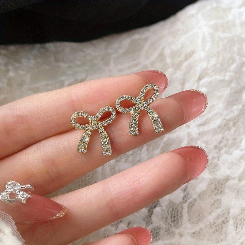 Exquisite Golden Bowknot Design With Shiny zirconia Decor Stud Earrings Elegant Cute Style Alloy Jewelry Gift For Lovers