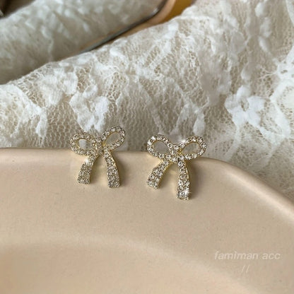 Exquisite Golden Bowknot Design With Shiny zirconia Decor Stud Earrings Elegant Cute Style Alloy Jewelry Gift For Lovers