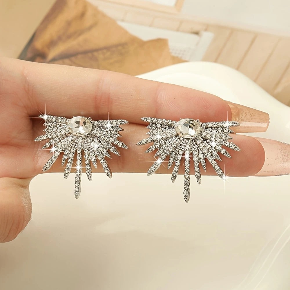 Pair Of Elegant And Stylish Earrings With Shiny Wing Design